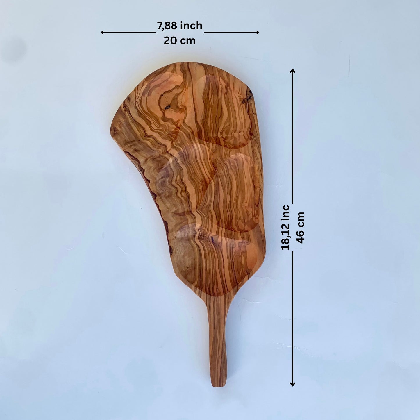 Wooden platter with measurements on a light blue background