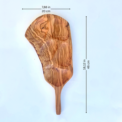 Wooden apetizer with measurements on a light blue background